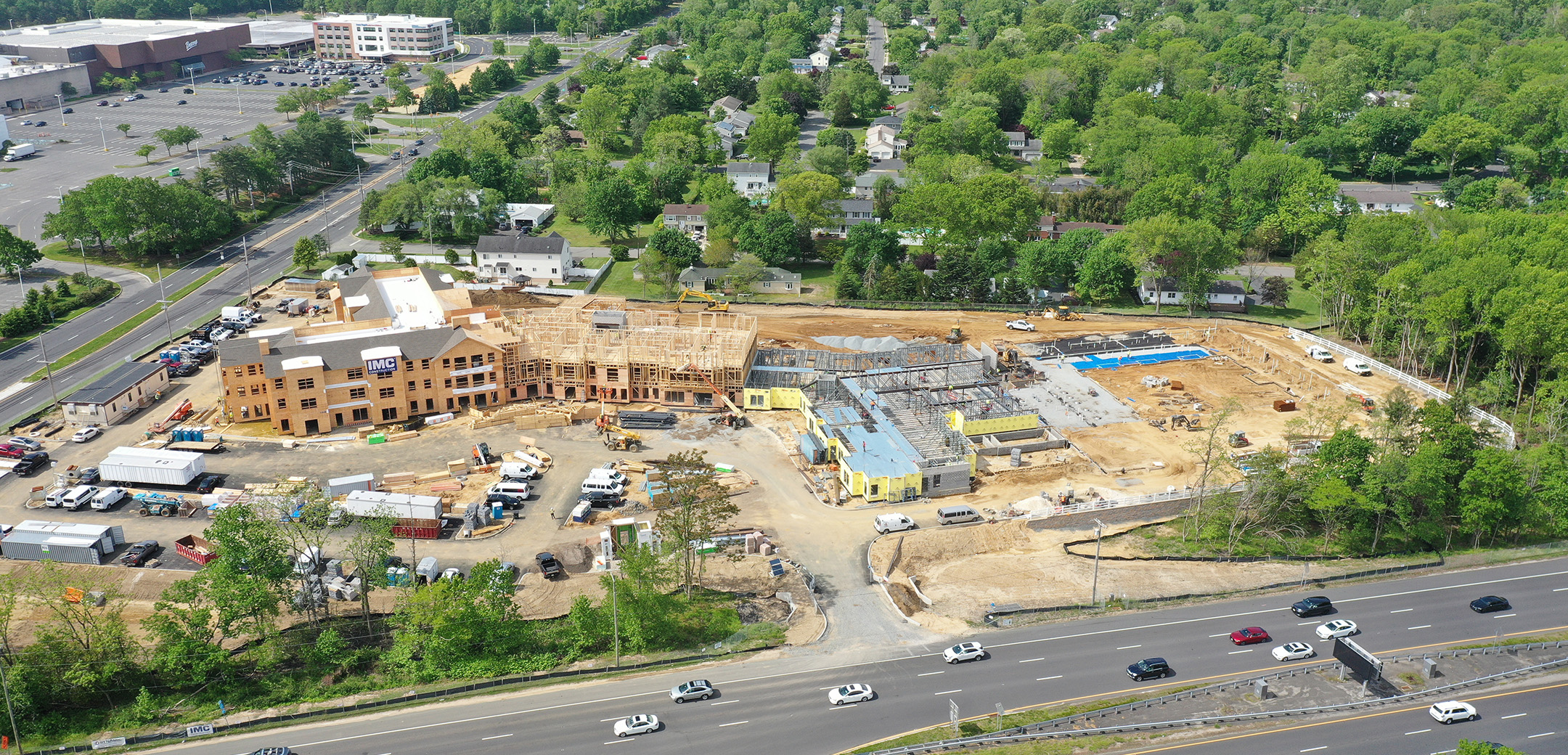 An aerial drone shot of Brightview Eatontown Senior Living Facility under construction.