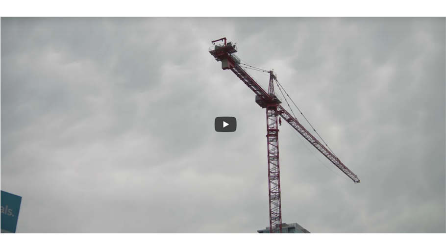 Stillshot of large crane among clouds for 2222 Market Street project video series