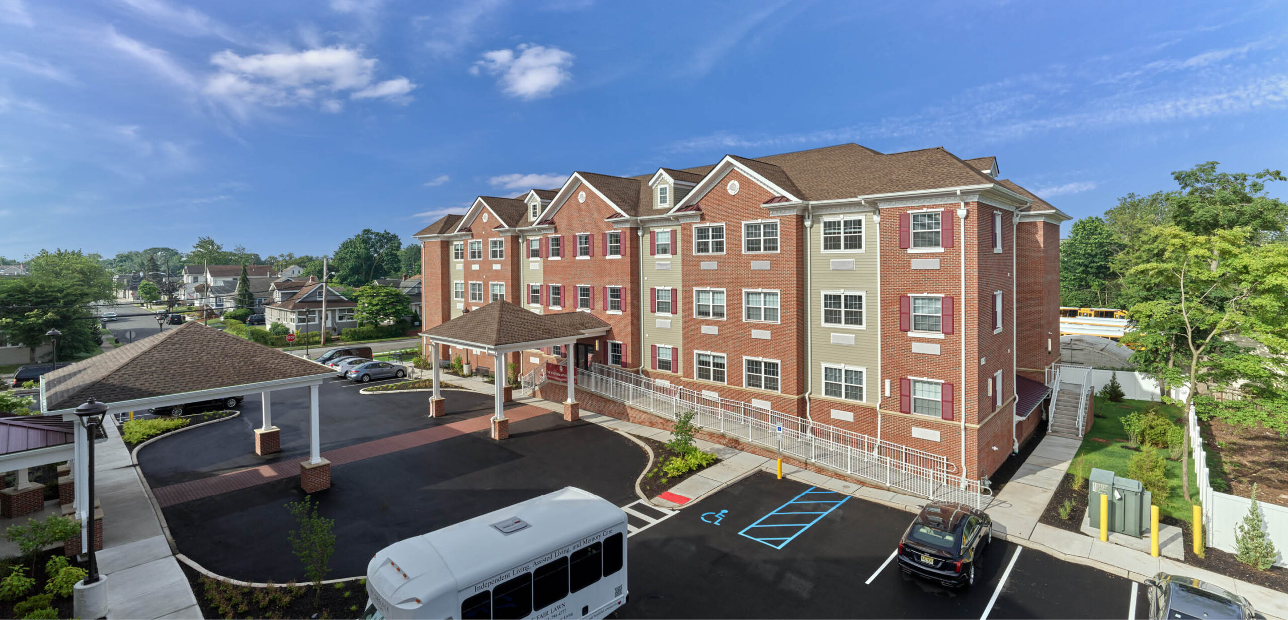 Side view of senior living facility with brick and siding