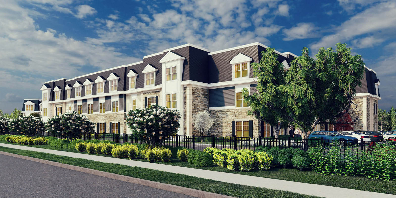 Rendering of senior living facility with lush landscape