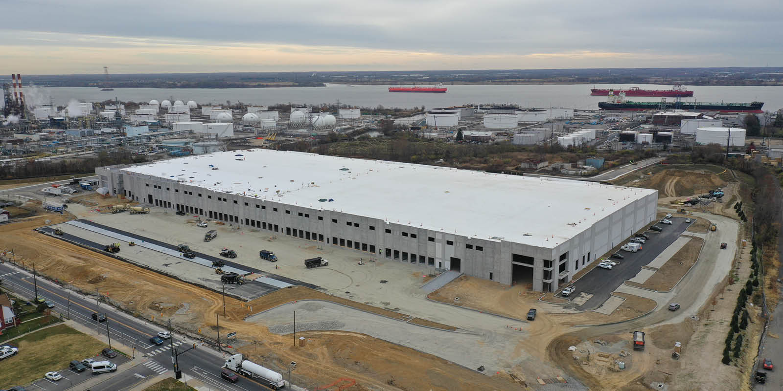 Aerial view of warehouse building with Delaware River in background